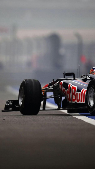 Red bull racing car driving - car free wallpaper for mobile