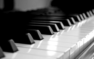 Piano keyboard black background white - a close up of a piano keyboard free wallpaper