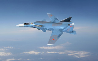 Fighter jet blue sky clouds 23 - a jet fighter free wallpaper