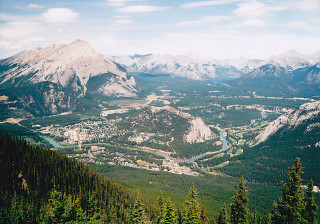 Valley mountains town river high - a view of a valley and mountains free wallpaper