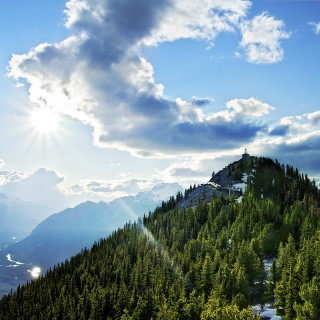 Mountain forest sky clouds sunlight - free mountains wallpaper for tablet