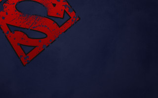Red superman logo blue background - grungy free wallpaper for desktop