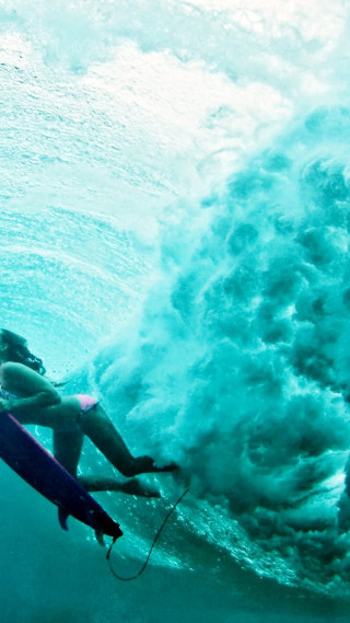 Woman surfing ocean wave helmet - in the ocean free wallpaper for mobile