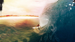 Man riding wave surfboard ocean 42 - sunrise time free wallpaper for desktop
