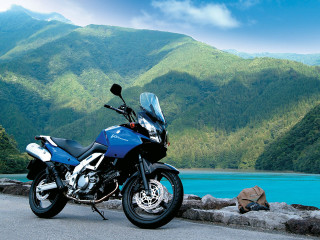 Motorcycle parked lake mountains blue - a motorcycle free wallpaper for desktop