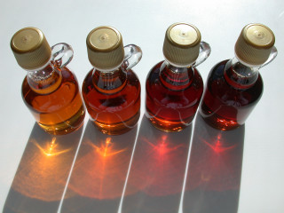 Three bottles liquid table shadow - product photo free wallpaper for desktop