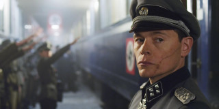 Man uniform train arms up - his hand out free wallpaper