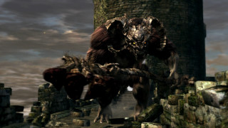 Giant monster stone wall tower - a giant monster free wallpaper