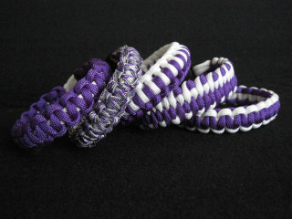 Purple white paracordings black background - a cross stitch free wallpaper for desktop