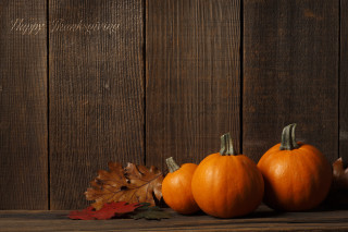 Three pumpkins wooden table happy - a happy thanksgiving free wallpaper