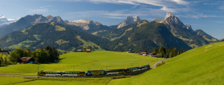 Train green countryside mountains forest - a train traveling free wallpaper for desktop