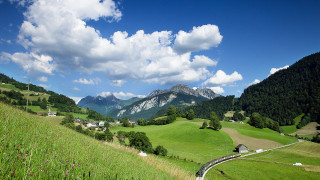 Green valley mountain road fence - a green valley free wallpaper