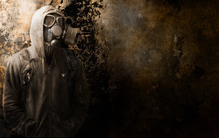 Man gas mask rusted wall - apocalyptic free wallpaper
