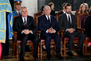 Men suits ties room group - a group of men sitting next free wallpaper