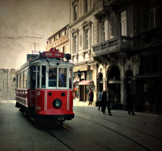 Red trolley cityscape skyscraper outdoors - free retro wallpaper for tablet