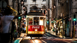 Trolley car night city street - a street in a city free wallpaper