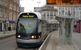 Train cityscape stationstreet sidewalk buildings - building and people free wallpaper