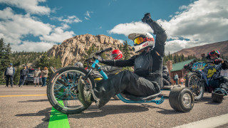 Man motorcycle helmet wheelie parade - dave arredondo free wallpaper