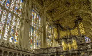 Cathedral stainedglass pew gothic architecture - a large cathedral free wallpaper