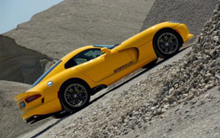 Yellow sports car desert hill - a yellow sports car free wallpaper for desktop