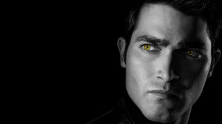Man yellow eyes black shirt 2 - dark shadow free wallpaper