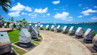 People rocks water sky background - free beach wallpaper for desktop