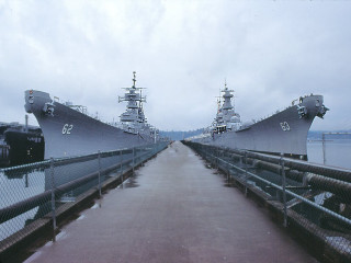 Large ships docked pier water - a few person free wallpaper for desktop