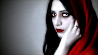 Woman red eyes red scarf - her neck and a ring free wallpaper