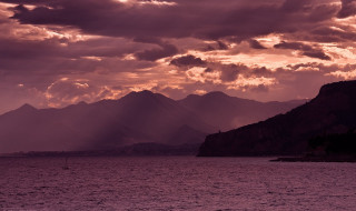 Boat water cloudy sky mountains 2 - the water under a cloudy sky free wallpaper