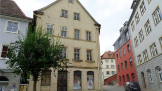 Car parked building street corner - a street corner free wallpaper