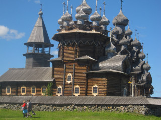 Wooden castle spires grassy field - andrei rublev free wallpaper
