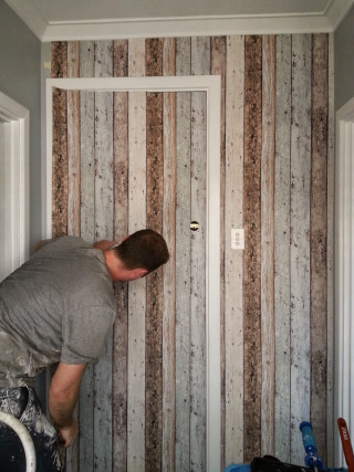 Man painting striped wall ladder - temporary free wallpaper for mobile