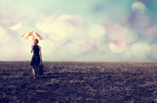 Woman umbrella field sky blurry - liminal free wallpaper