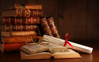 Stack books glasses red ribbon - a pair of glasses free wallpaper