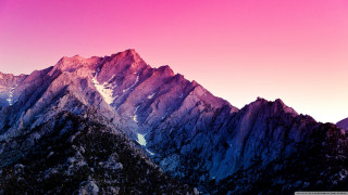 Mountain range pink sky background - a pink sky in the foreground free wallpaper