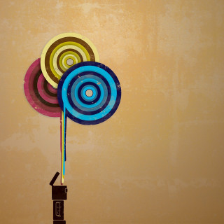 Colorful paper pinwheel brown yellow - surreal design free wallpaper for tablet