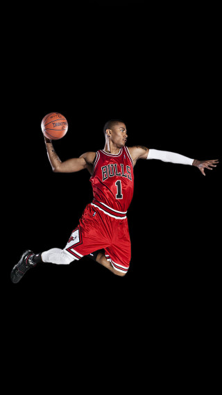 Man red uniform jumping basketball - free sports wallpaper