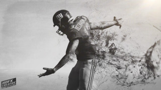 Football player throwing ball arms - a ball in the air free wallpaper