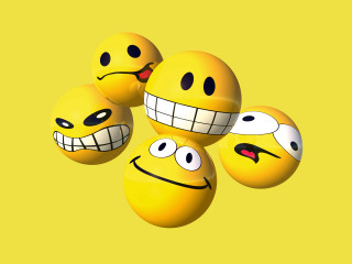 Yellow balls painted faces eyes - cheerful free wallpaper