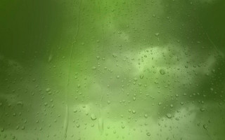 Green background raindrops sky clouds - a green background free wallpaper