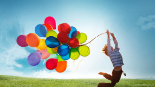 Person jumping balloons air happy - cheerful free wallpaper