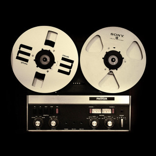 Stereo tape recorder black background - a still life free wallpaper for tablet