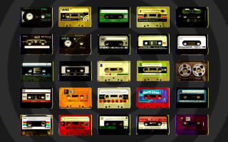 Cassette tapes grid black background - retro free wallpaper for desktop