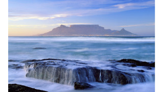 Mount fuji lake ocean waves - a mountain in the background and a body of water free wallpaper
