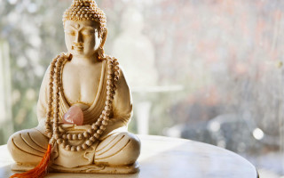 Buddha statue table window red 2 - a buddha statue free wallpaper