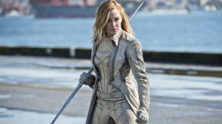 Woman leather outfit sword stick - a leather outfit holding free wallpaper for desktop