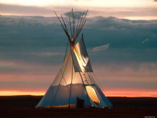 Teepee sunset field clouds sky 2 - a sunset in the background free wallpaper for desktop