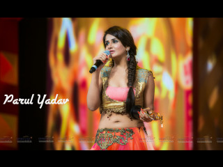 Woman colorful outfit singing microphone - a colorful background behind her free wallpaper