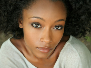 Woman black hair curly portrait - beautiful bone structure free wallpaper