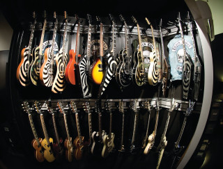 Zebra print guitars rack middle - maximalist free wallpaper for desktop